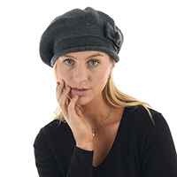 Wear a beret with the crown tilted onto one side